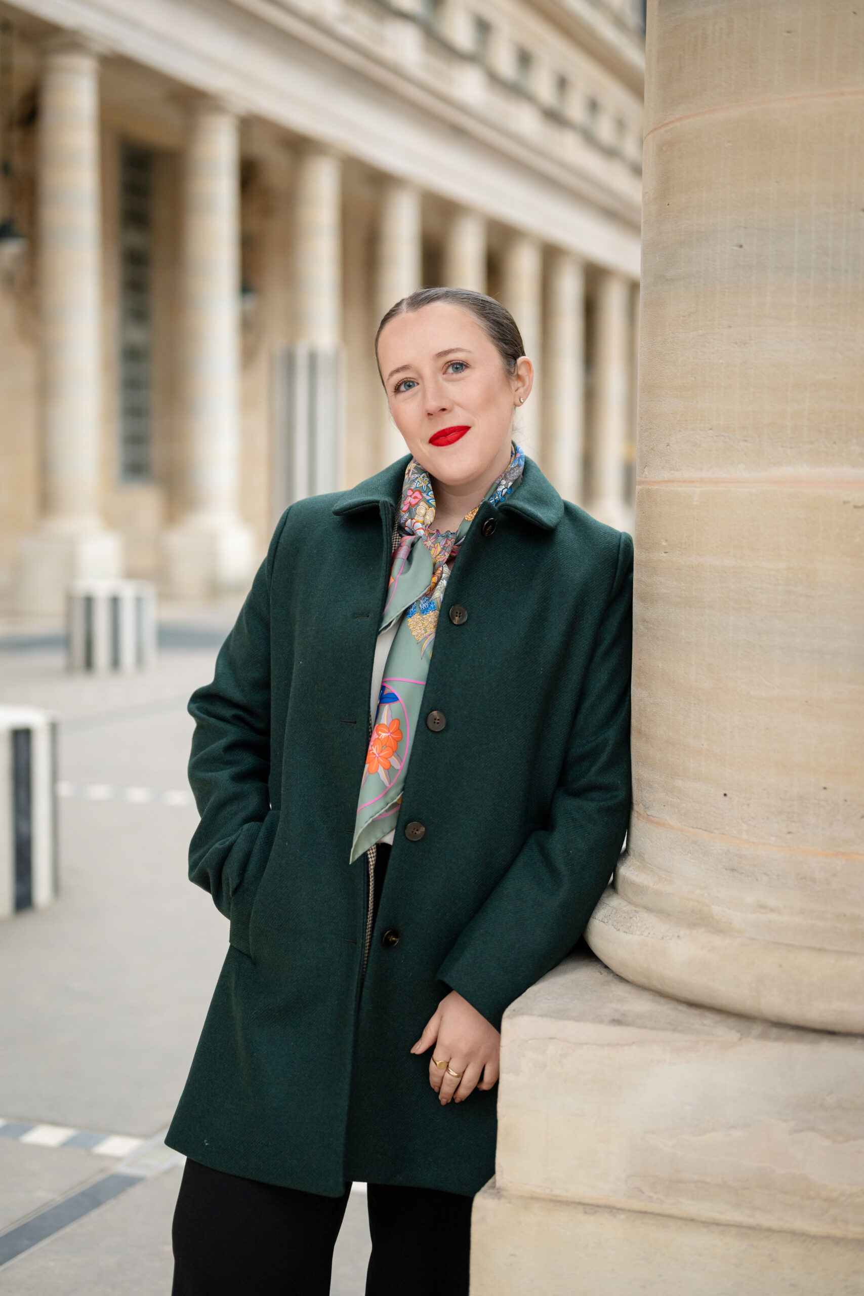 Wine and food travel advisor Kathryn of Mistral Winds Travel standing in Paris France