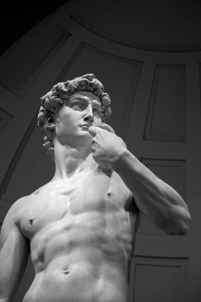 Michelangelo David statue detail at Galleria dell'Accademia in Florence Italy - Renaissance art masterpiece and must-see cultural attraction for luxury Florence tours and Italian art history travel experiences