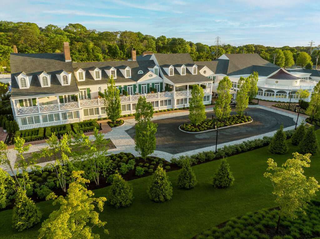 Historic Canoe Place Inn Southampton Hamptons elegant lobby with fireplace for romantic weekend getaway