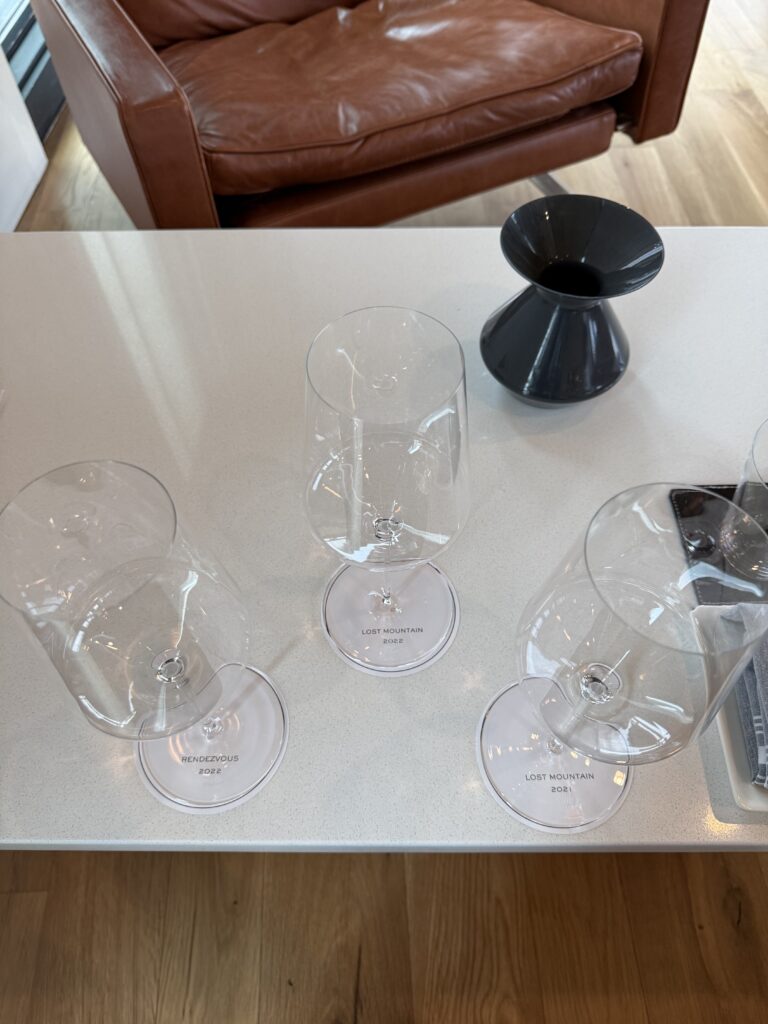 Wine glasses prepared for a tasting of Rendezvous and Lost Mountain wines at Lost Mountain Vineyards in Delaplane Virginia.