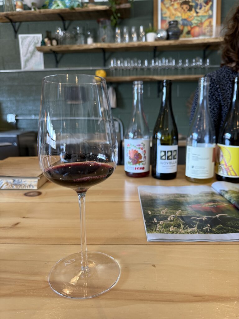 Red wine glass during a tasting at Common Wealth Crush winery in the Shenandoah Valley